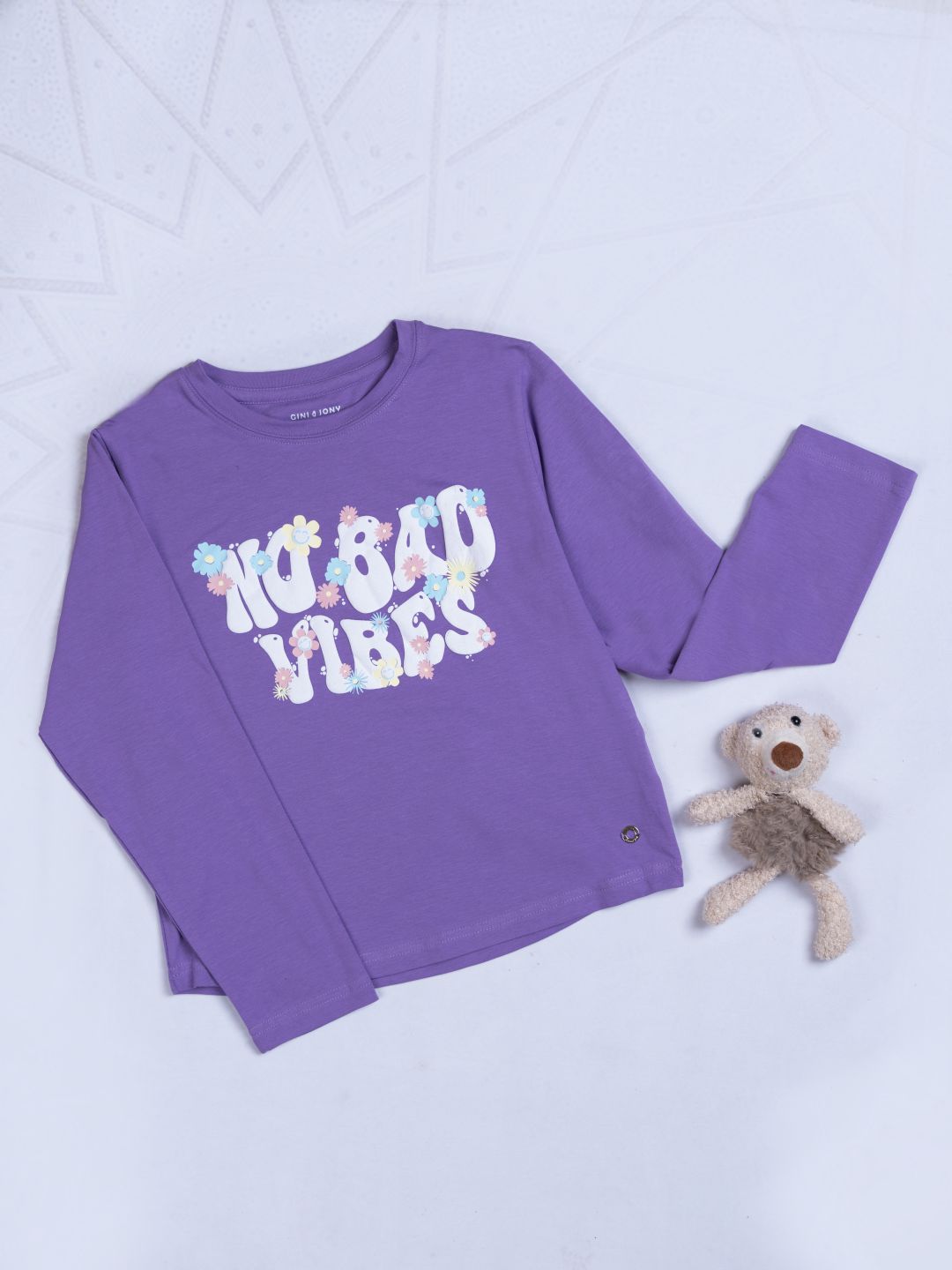 Girls purple round neck knitted cotton printed top.
